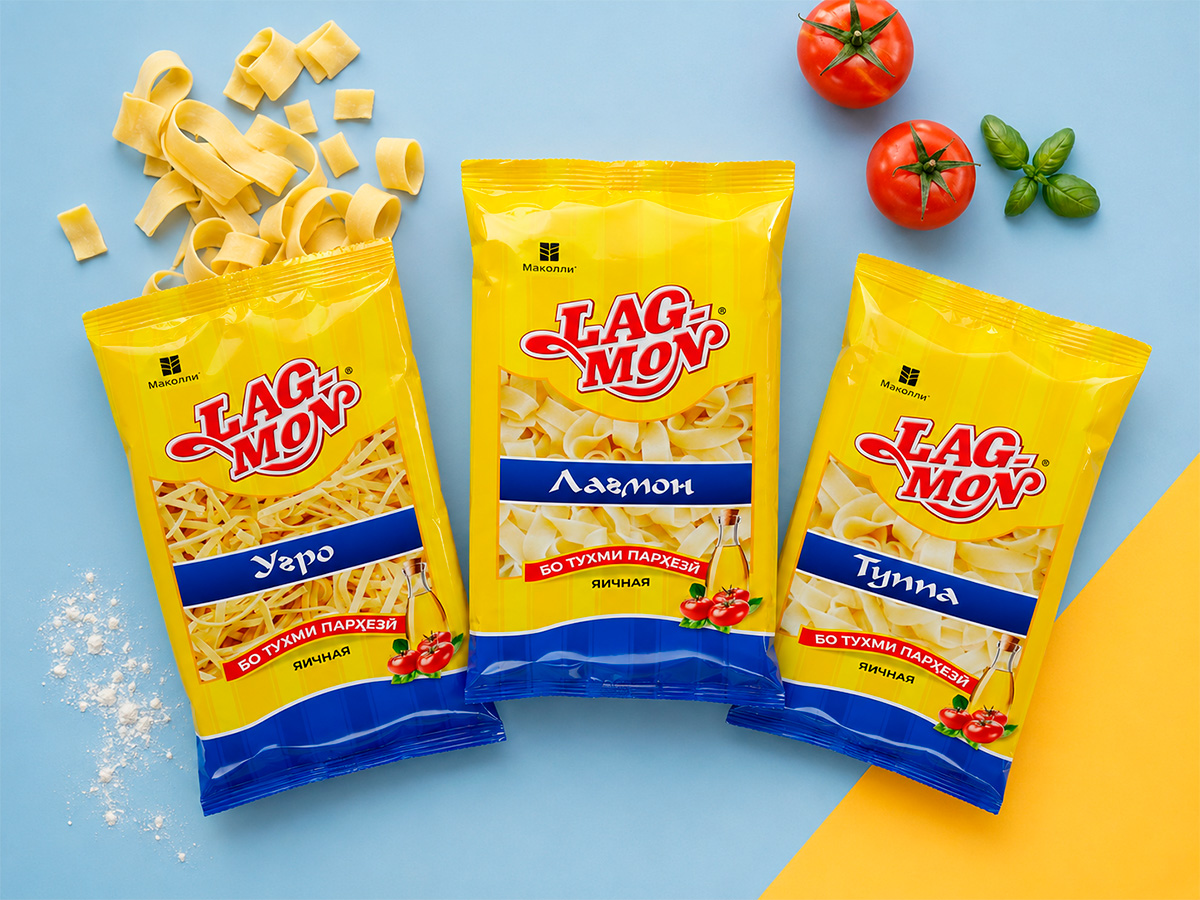 LAG-MON — Egg-noodle packaging range with a transparent window, color-coded formats, and prominent branding by FORMA